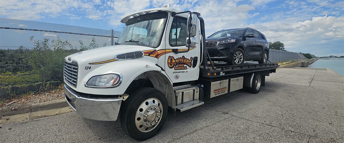 Overland Tow Service truck providing roadside assistance services in Johnson County, KS.